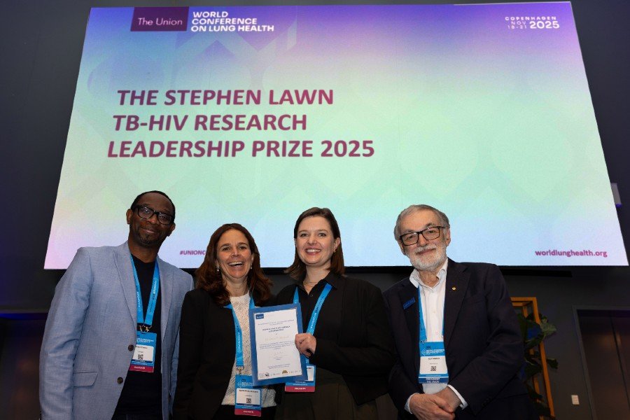 Claire with Dr Guy Marks & LSHTM professors 