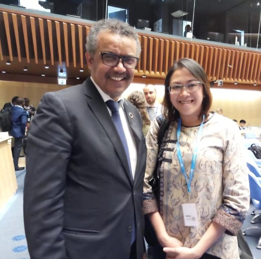 Elizabeth  Salmon with WHO Director General Tedros