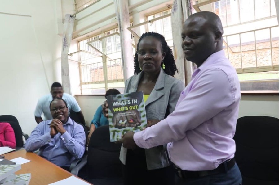 Makerere University School of Public Health&#039;s Department of Health Policy Planning and Management receiving a consignment of books from iDSI. Credit: iDSI