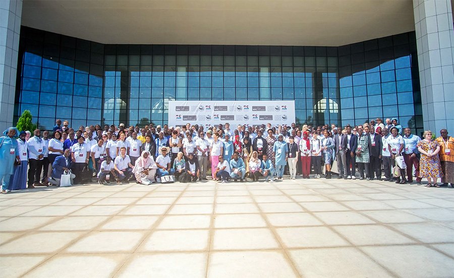 Scientists, policymakers, students and partners pose for a group photo