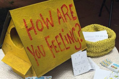 How are you feeling sign on a table