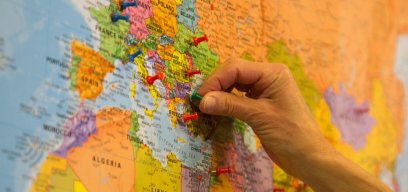 hand on map
