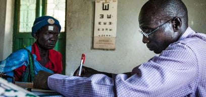 A patient receiving community eye health care from an ophthalmologist in South Sudan. Credit: Adriane Ohanesian/Sightsavers