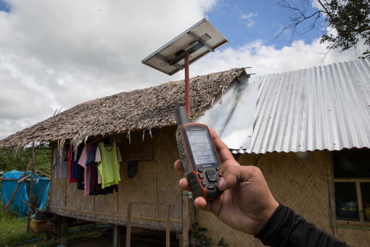 Checking for GPS coordinates before geo-tagging a village home in Philippines. Credit: Joshua Paul/LSHTM