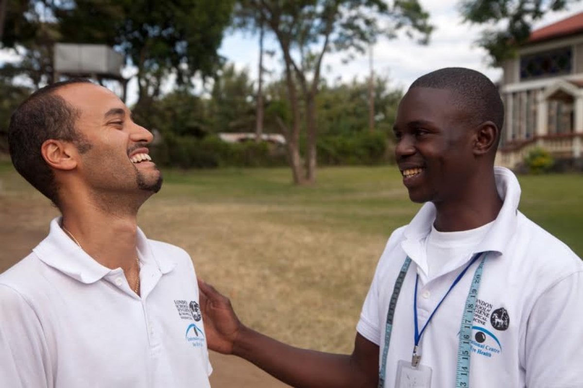 Cosmas (right) aged 24 in 2013 with Dr Andrew Bastawrous working together in Kenya. Credit: Peek
