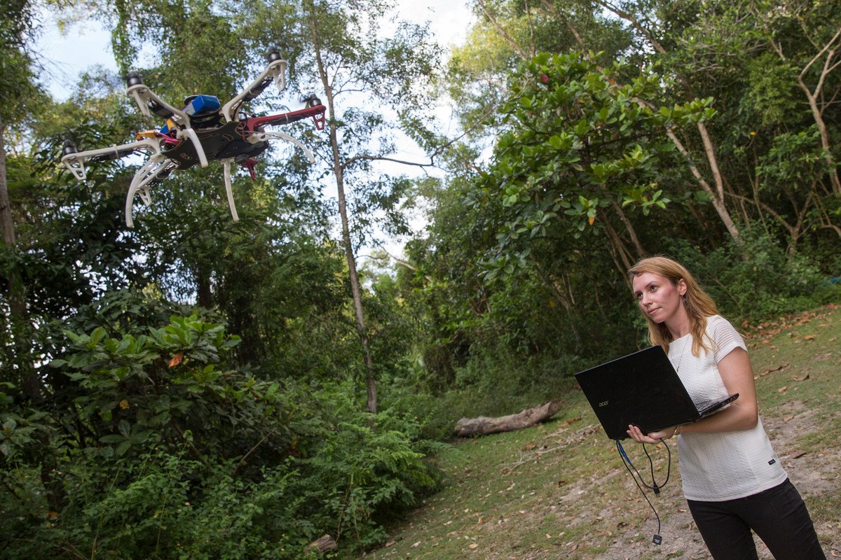 Research fellow Kimberly Fornace flies the drone that tracks deforestation linked to zoonotic malaria. Credit: Joshua Paul/LSHTM