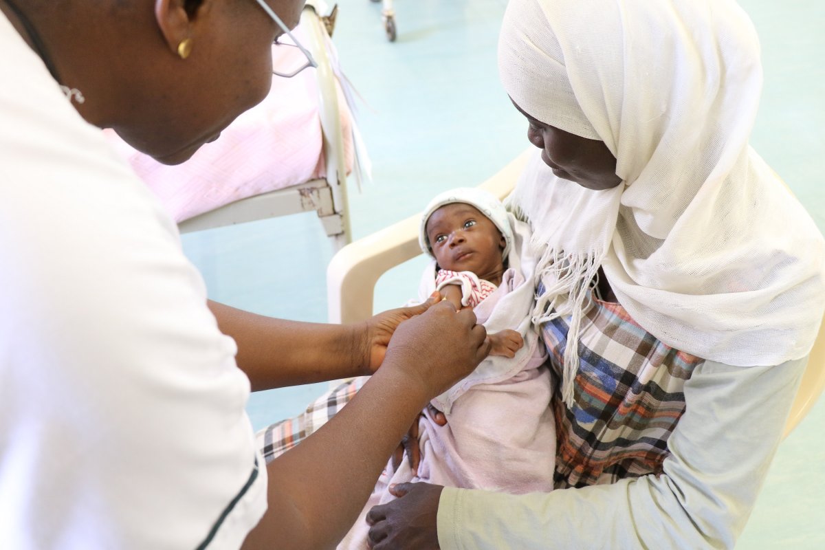 A baby being vaccinated by MRC Unit The Gambia at LSHTM staff. Credit: MRC Unit The Gambia at LSHTM