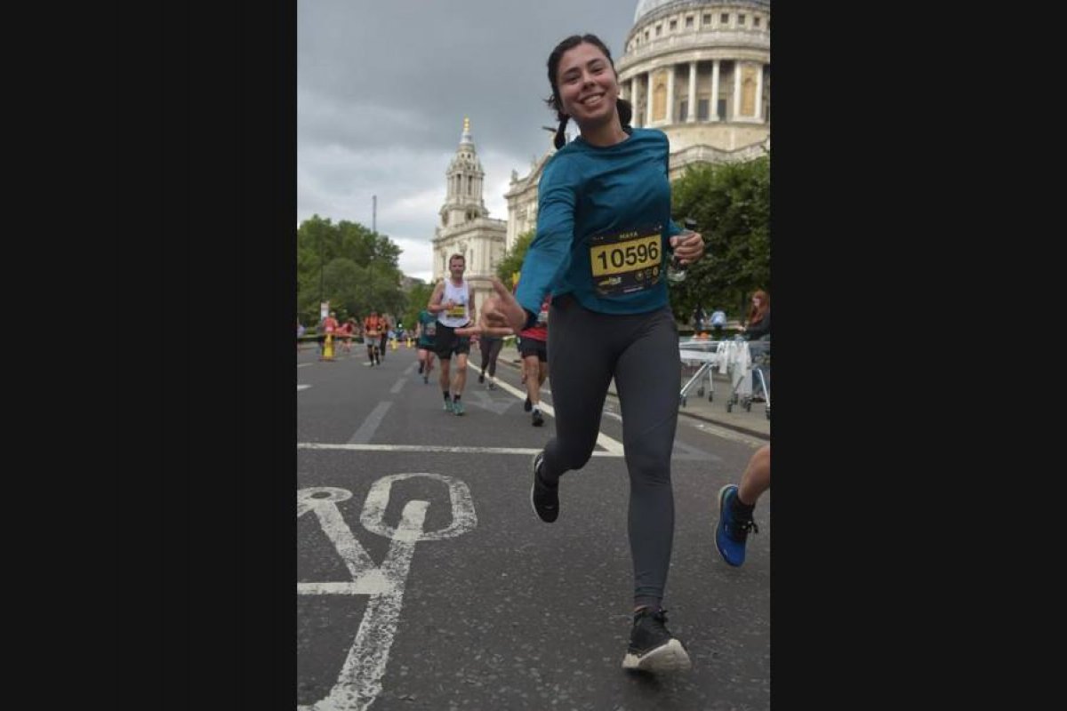 Maya Trivedy running past St Paul’s Cathedral