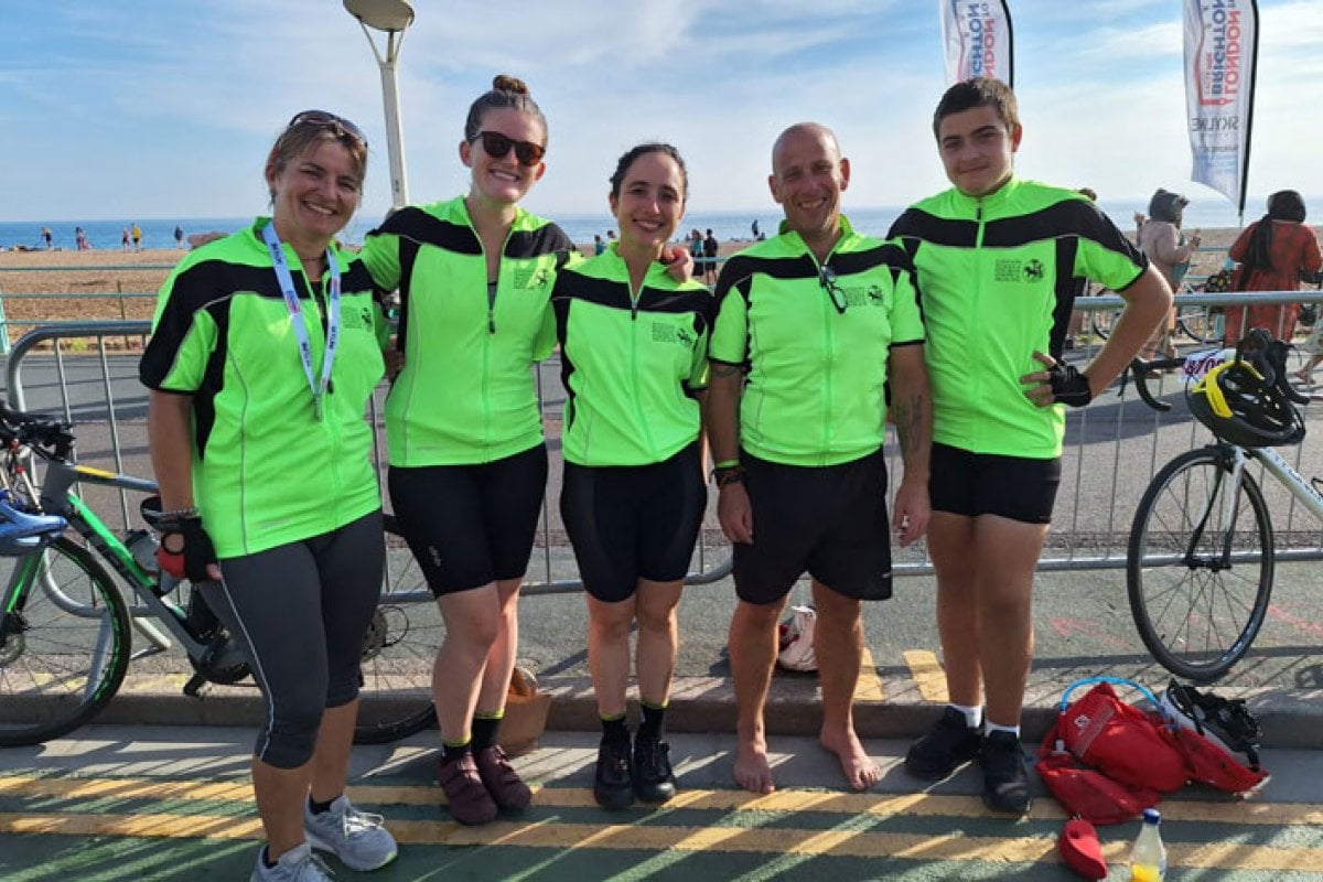 Arielle, Erin, Marjorie, Graeme and Alex reunite in Brighton before sunset, waiting for the rest of the team to join them on the seafront.