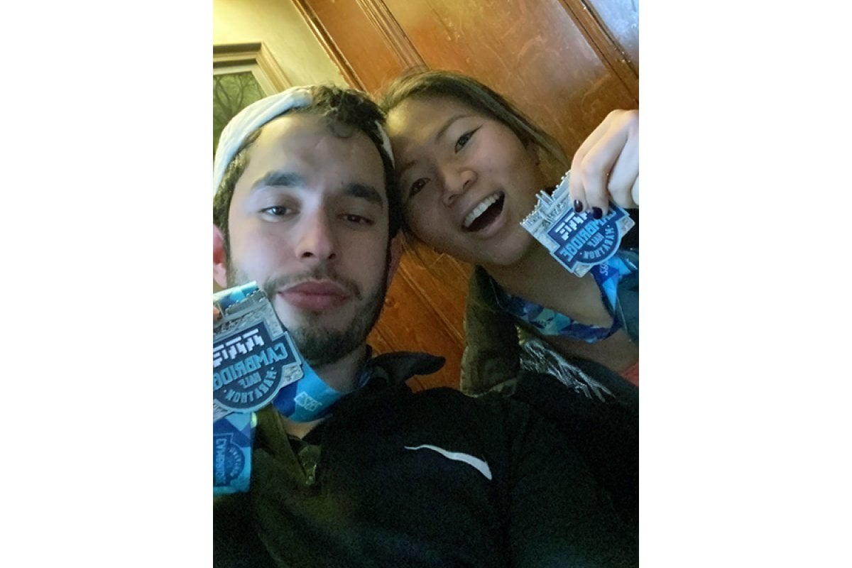 Former students and Student Callers Sara and Ismail with their finishing medals
