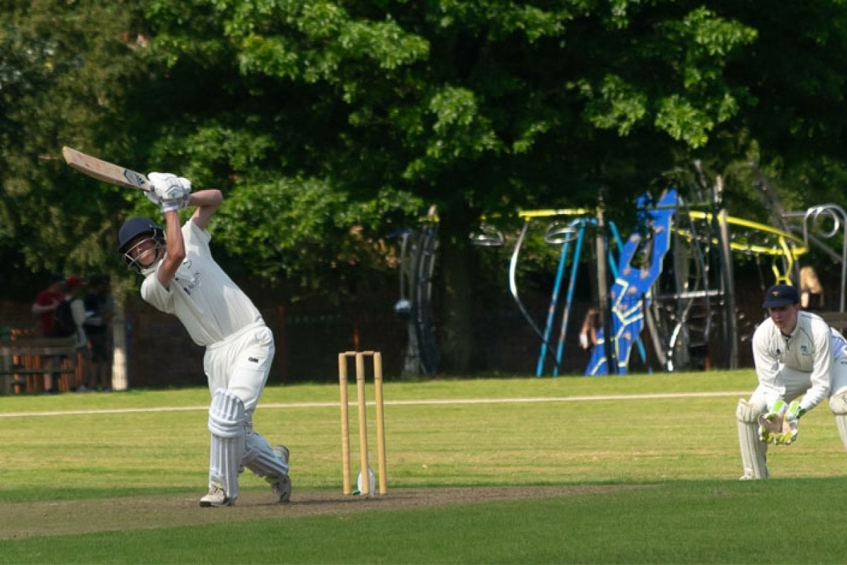 Val Curtis' family and friends playing cricket