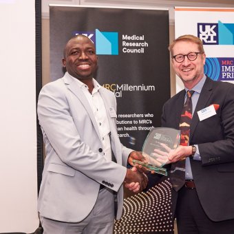 Dr. Segun Fatumo receiving the Inaugral MRC Early Impact Award in London/Photo Credit,Joel Knight 