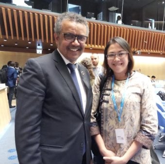 Elizabeth  Salmon with WHO Director General Tedros