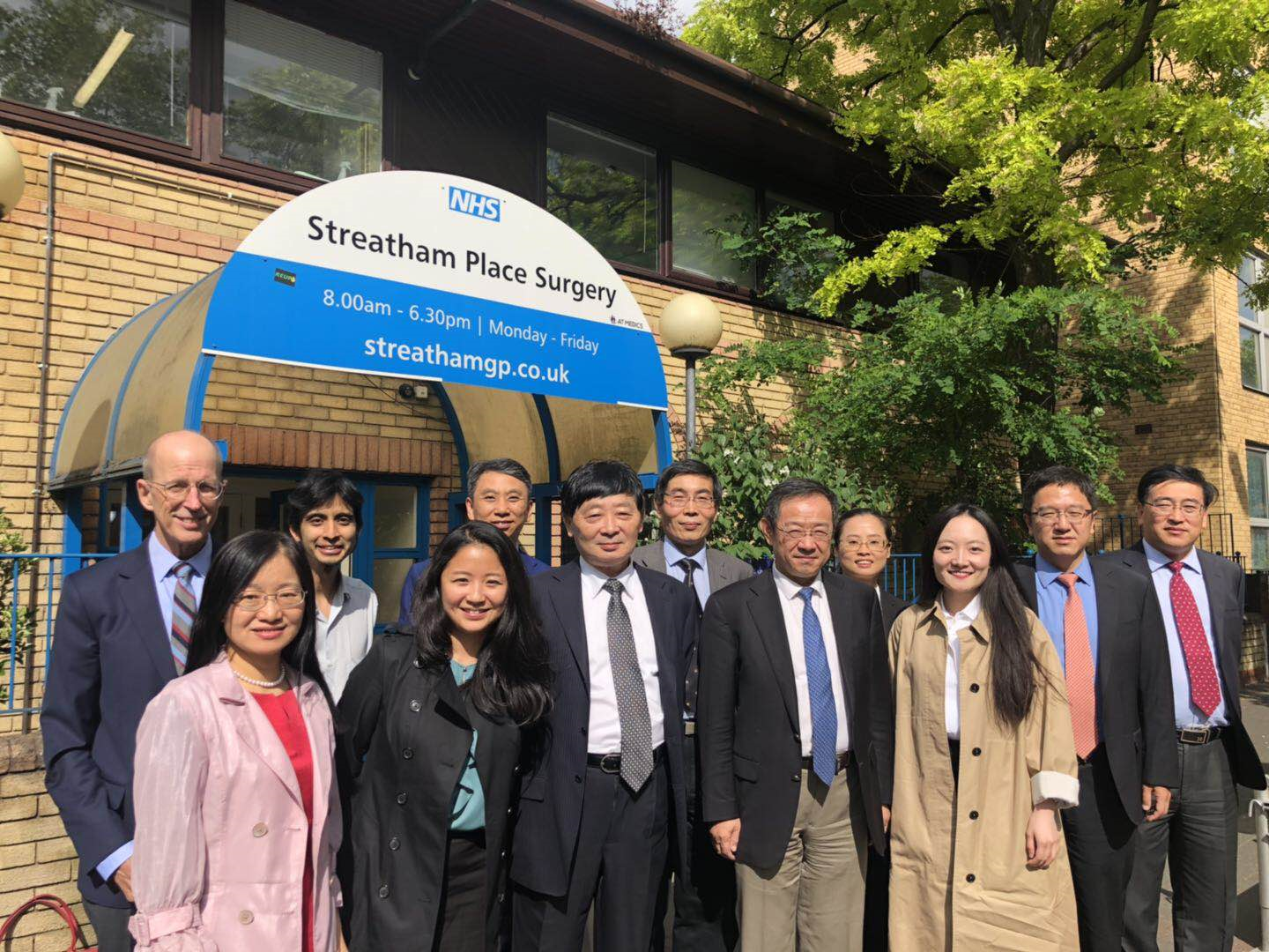 China delegates outside Streatham Place Surgery
