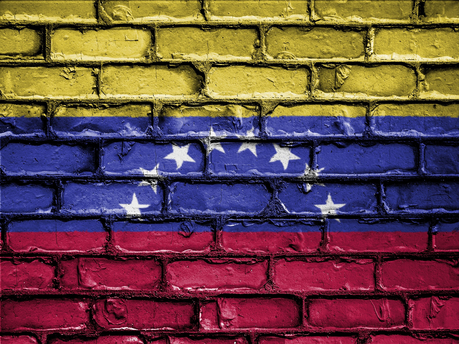 Caption: Venezuela flag on a wall. Credit: Pixabay