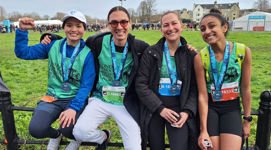 MSc students Yiggie, Sebastian, Sophie and Rishika - with the 2024 Cambridge Half Marathon medals